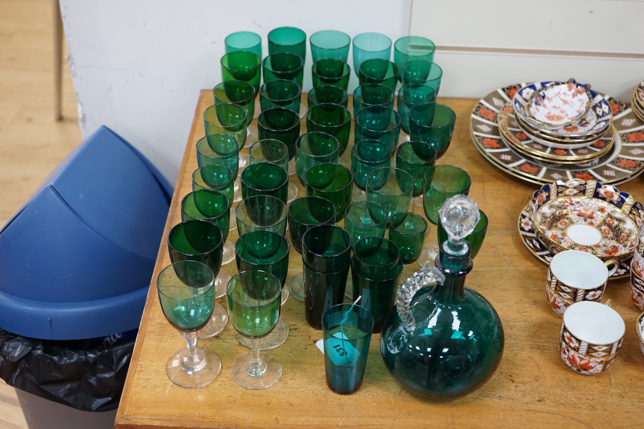 A collection of Victorian green glassware including a claret jug, 24cm. Condition - mostly good